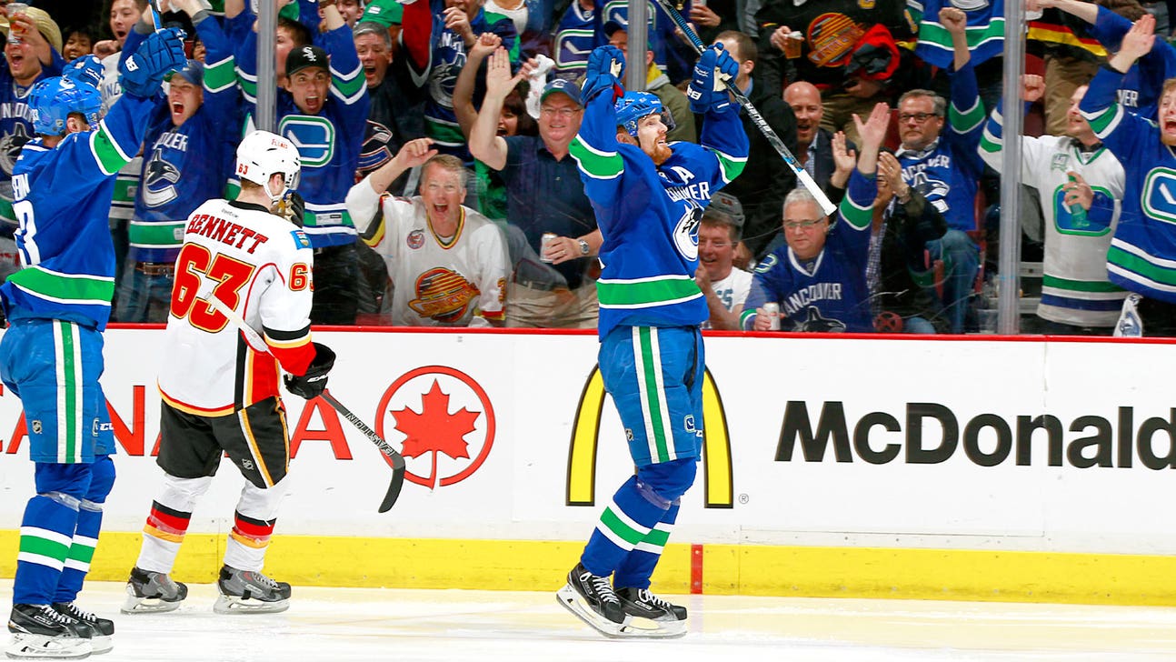 Canucks avoid elimination on Daniel Sedin tally in 3rd vs. Flames
