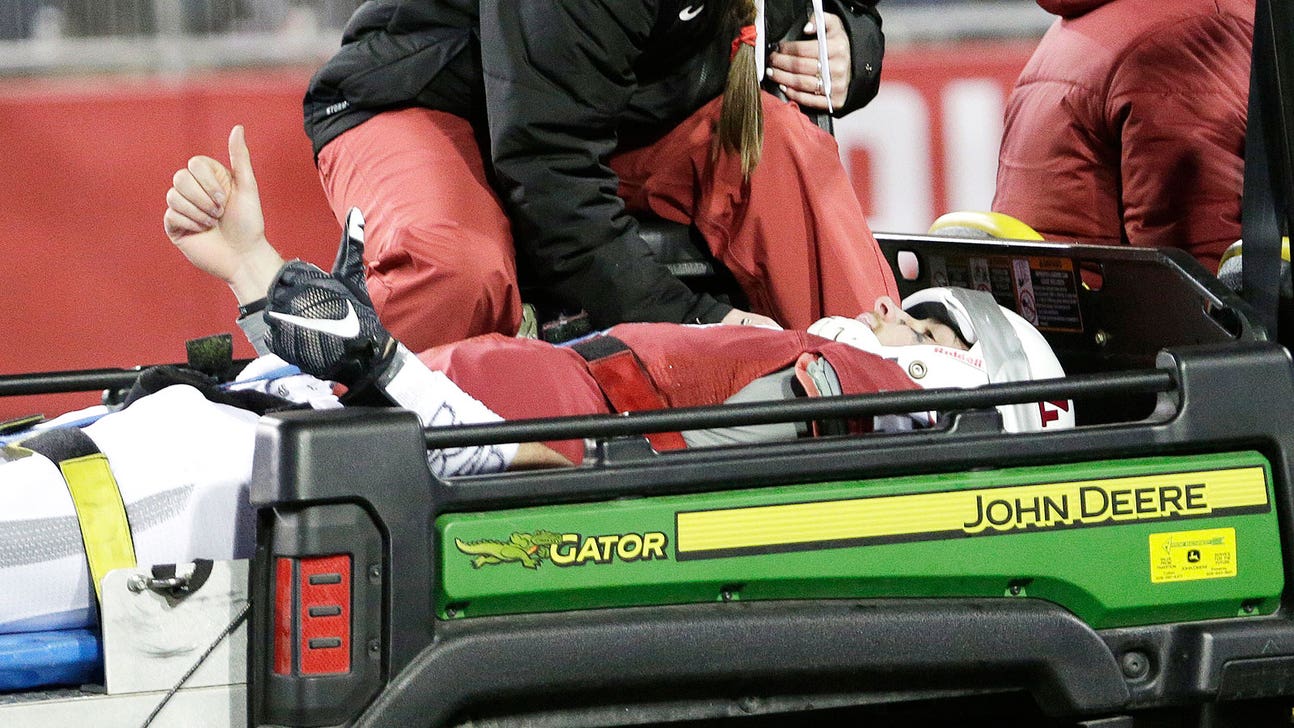 Washington St. QB carted off with head injury in win