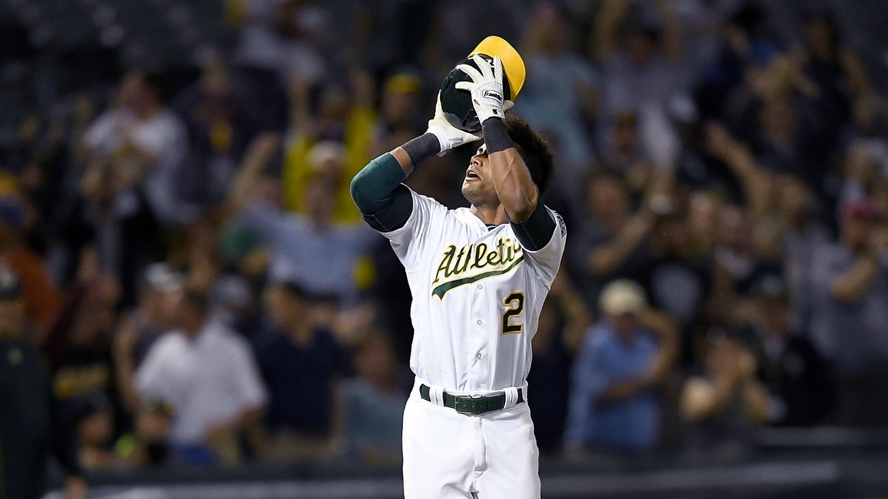 Khris Davis shoots his helmet like a basketball after hitting walk-off grand slam