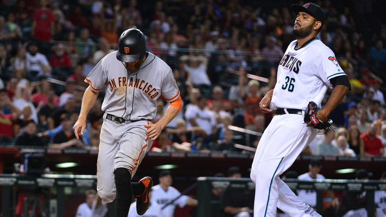 D-backs blow lead, lose to Giants in 12 innings