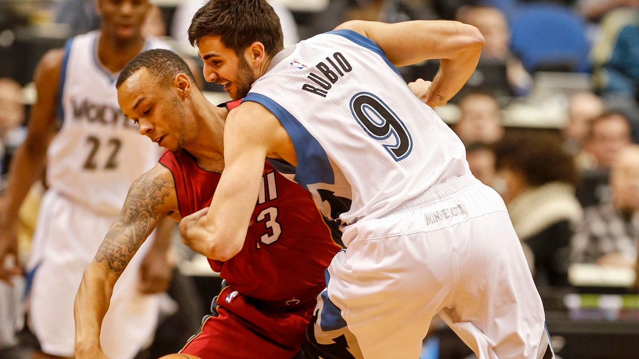 Rubio, Wolves withstand Heat, 102-101
