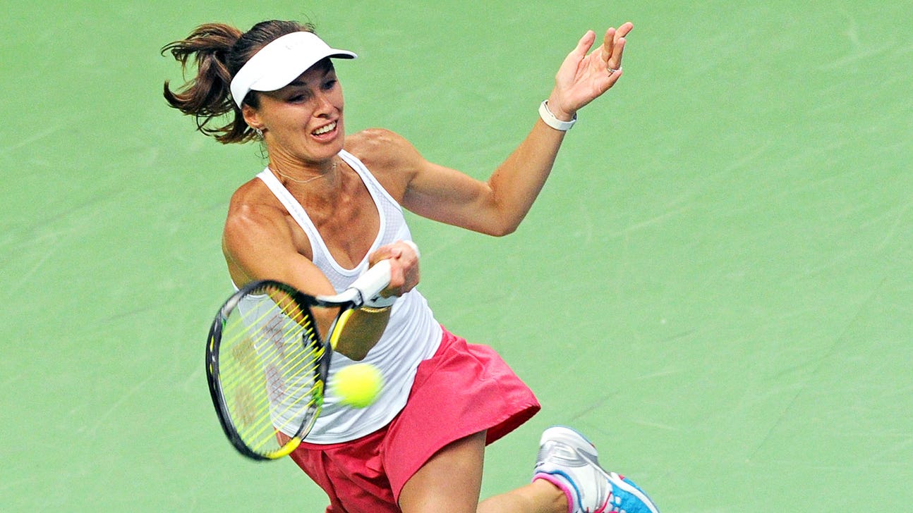 Hingis loses her first competitive singles match since 2007