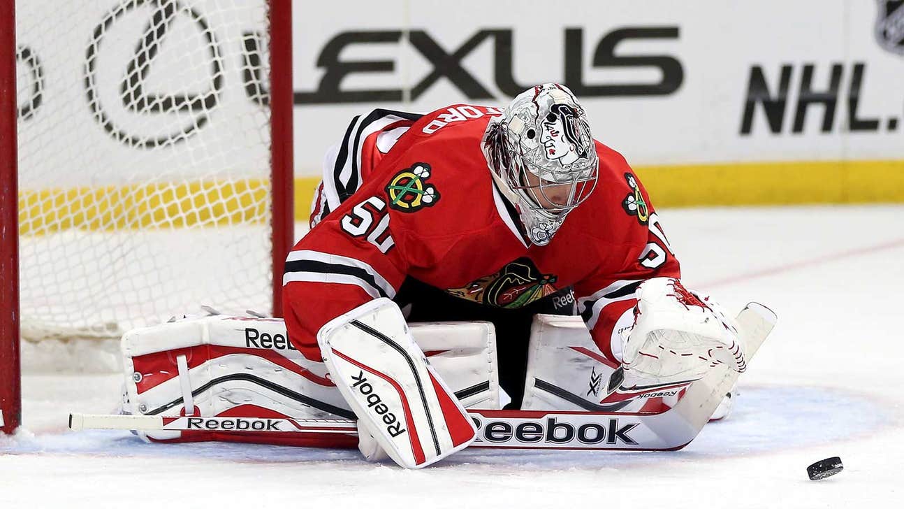 Blackhawks shut out Blues for Quenneville's 700th win; Kane hurt