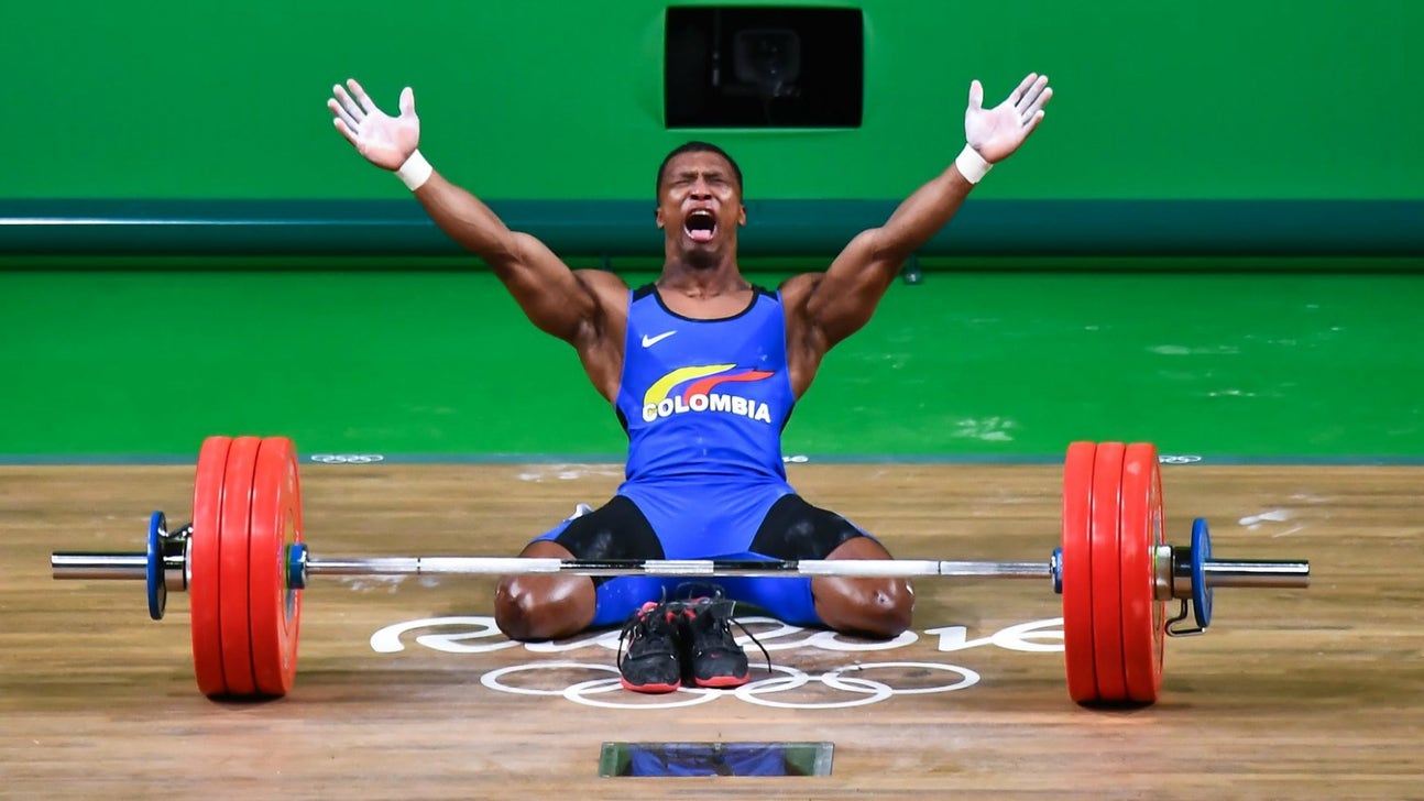 Colombian weightlifter wins gold medal, then retires on the spot