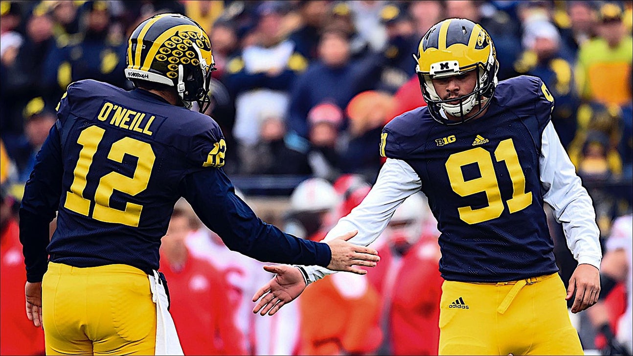 Michigan kicker Kenny Allen doing something special with part of his bowl gift
