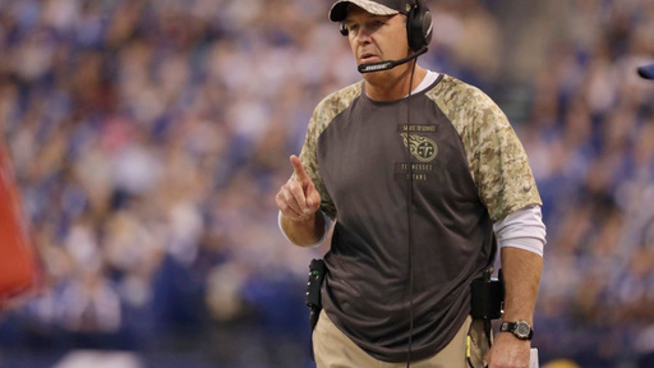 Titans coach says left tackle Lewan has sprained left knee