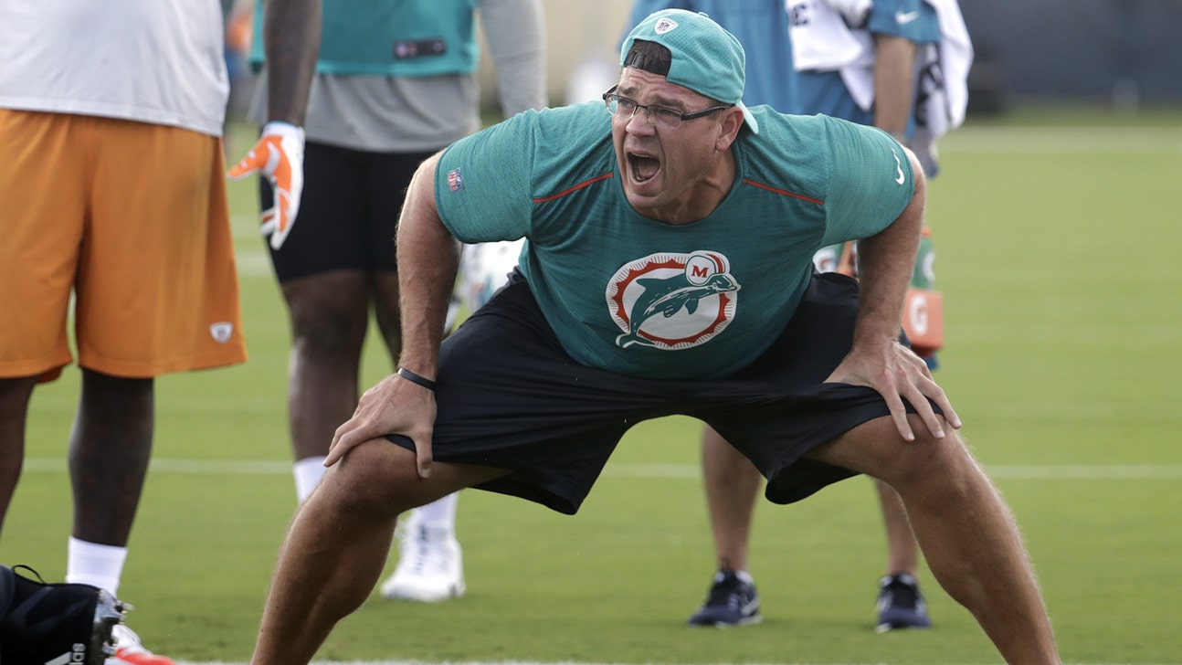 Loud and clear: Dolphins defensive line coach Kris Kocurek making himself heard
