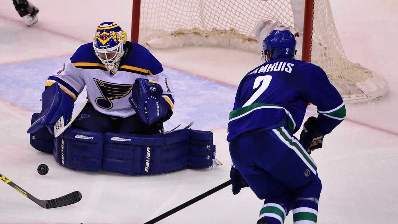 Blues shut out Canucks 3-0 in Elliott's return