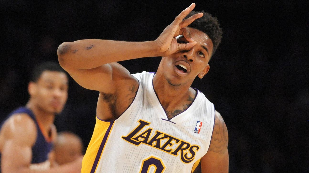 Lakers' Swaggy P breaks own rule, gets tattoo on arm 'strictly for buckets'