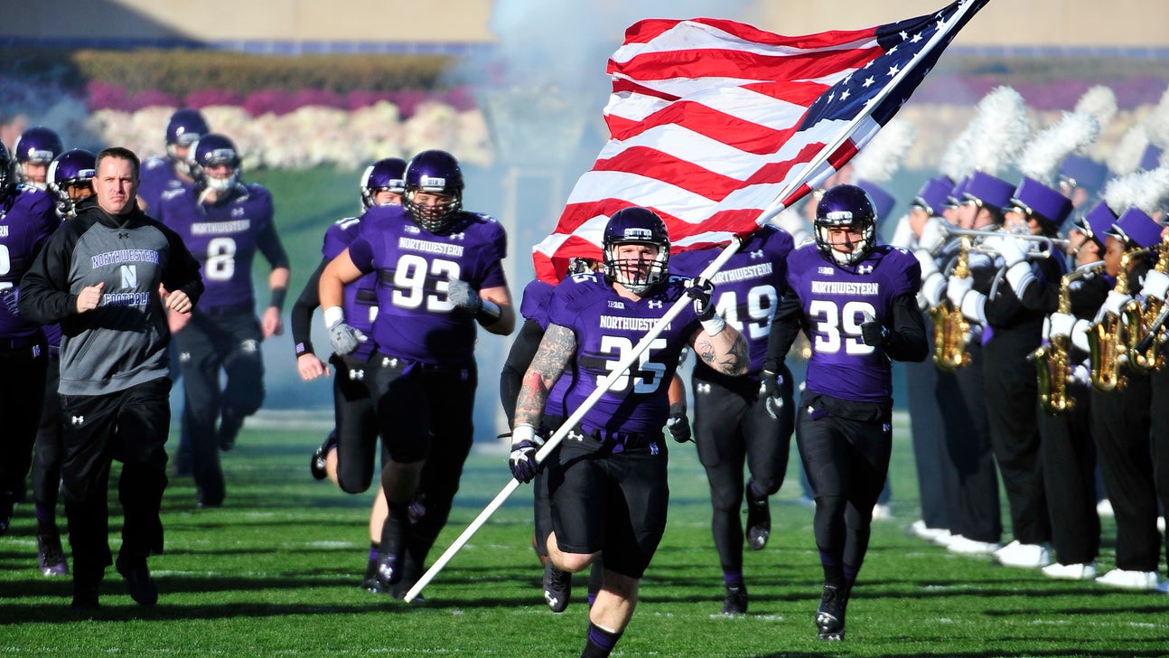 Northwestern carries retired Navy SEAL teammate off field in Veterans Day honor