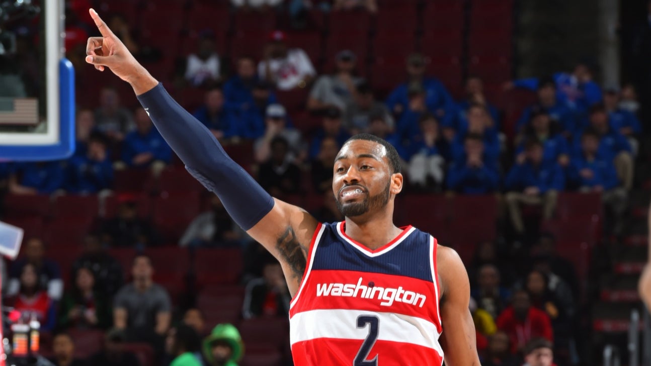John Wall pranks courtside fan, pretends to sip their drink