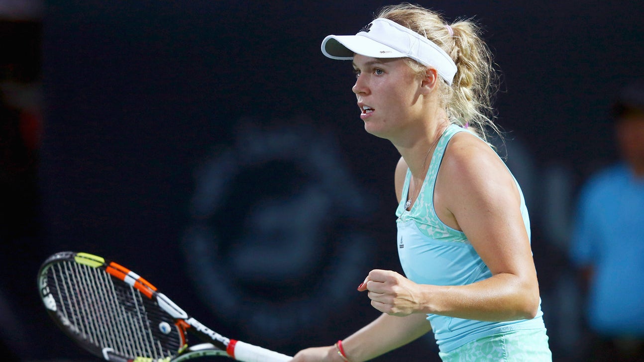 Caroline Wozniacki takes 3 sets to down Samantha Stosur at Dubai