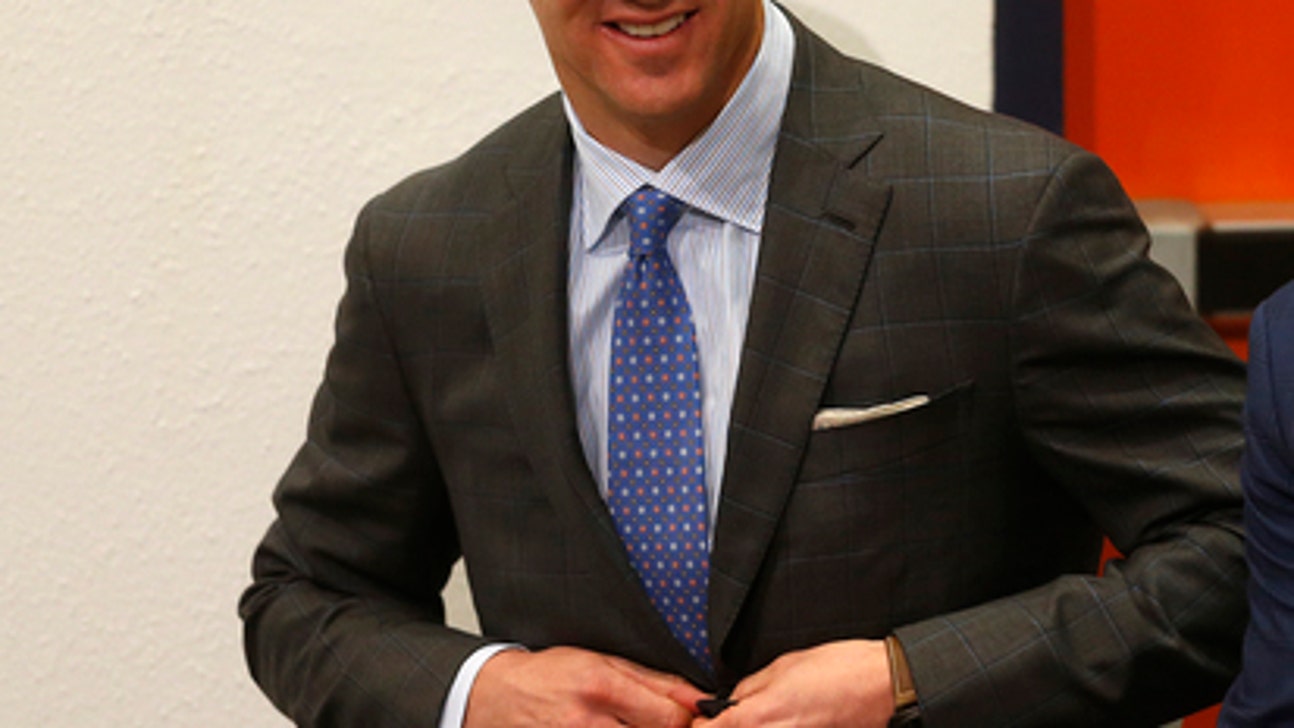 The Latest: Manning retires, pays tribute to Johnny Unitas