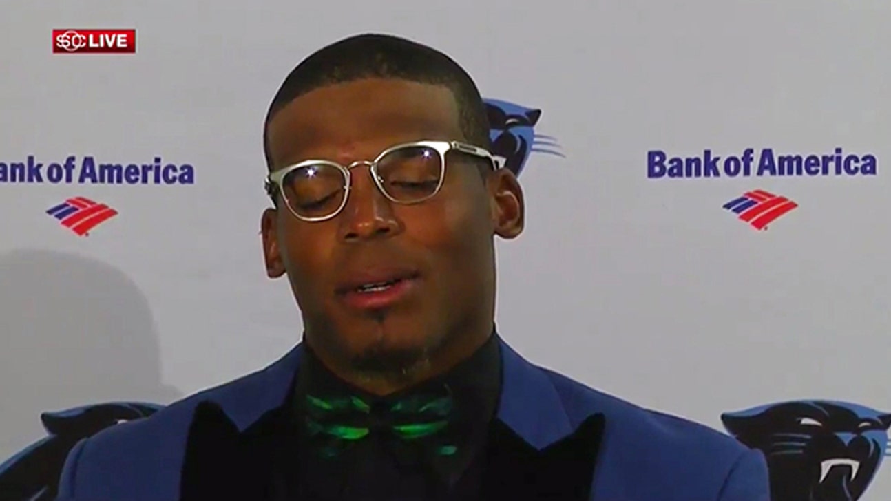 NFL Podium Fashion: Cam Newton Channels A Fashion-Forward Steve Urkel