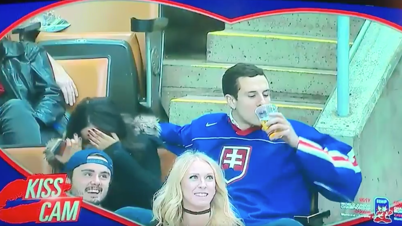 Hockey fan on Kiss Cam snubs girlfriend to smooch his beer
