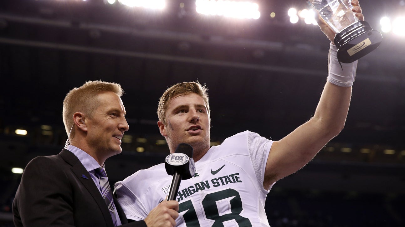 Connor Cook apologizes for brushing aside Archie Griffin