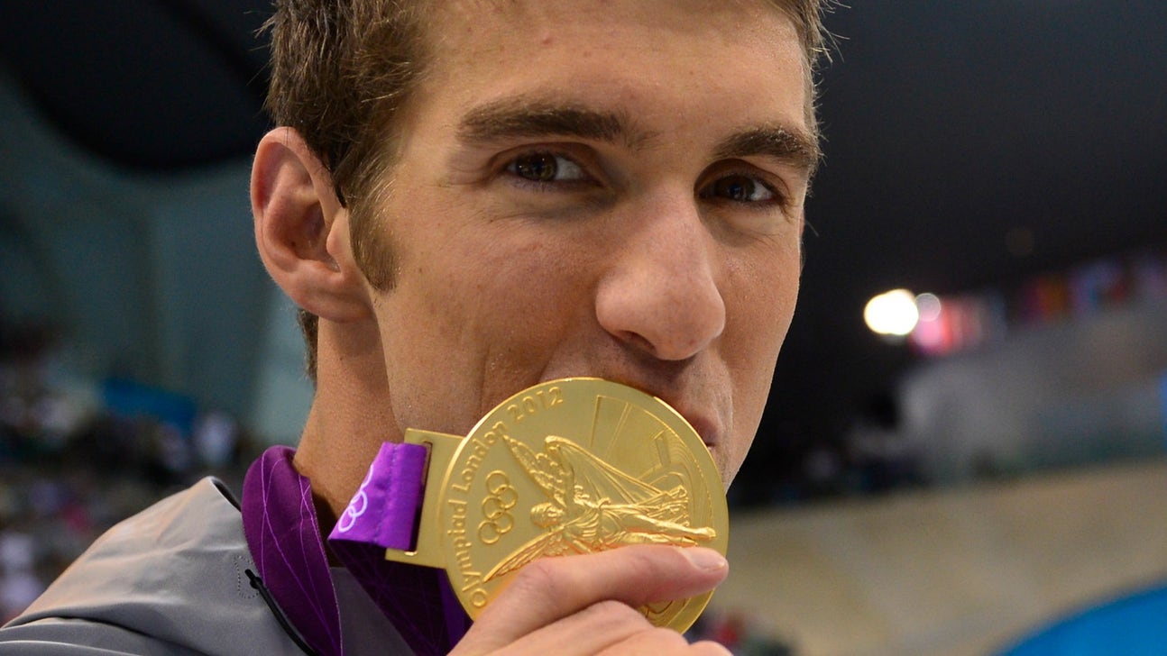 Chronicling Michael Phelps' history as king of the Olympic rings