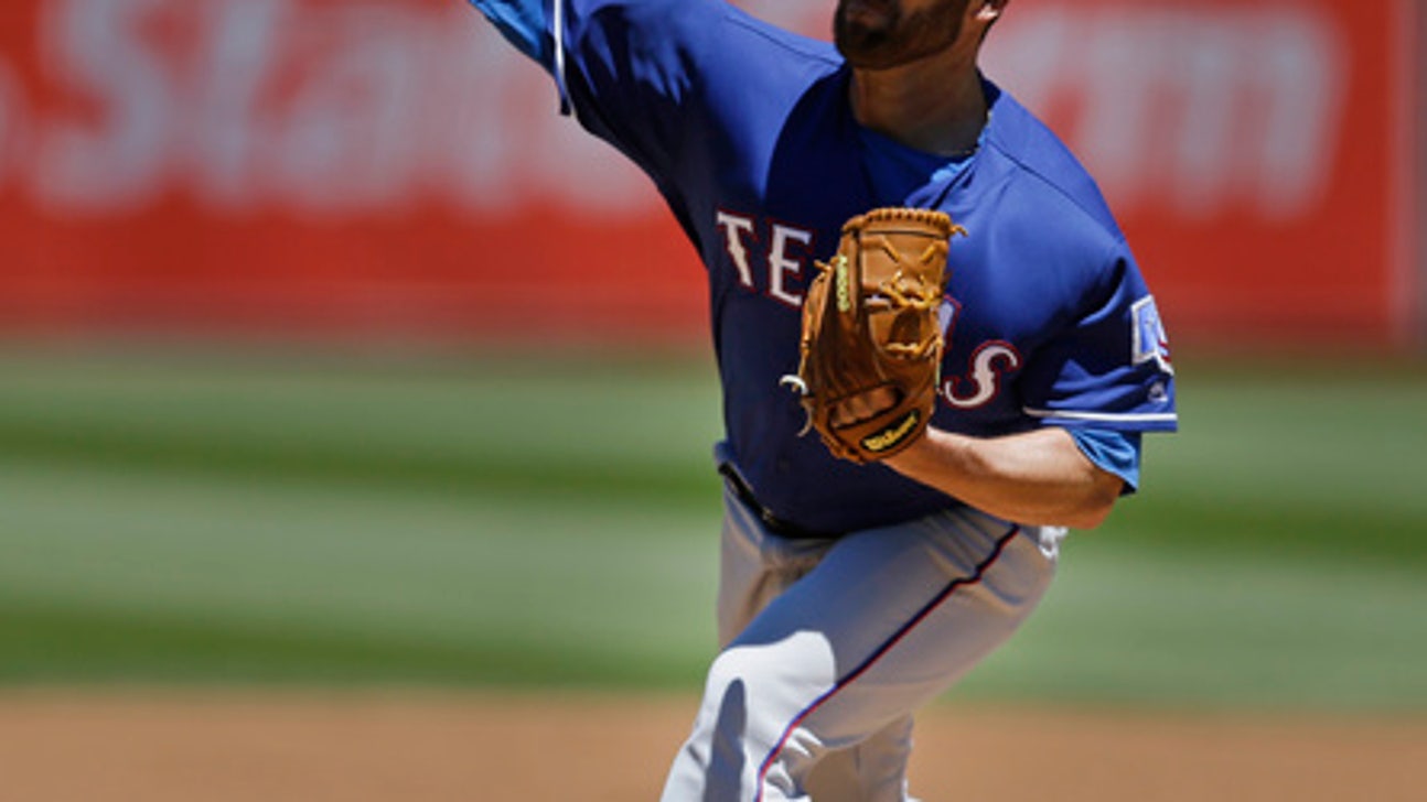 Rangers' Lewis pitching perfect game thru 6 innings vs A's