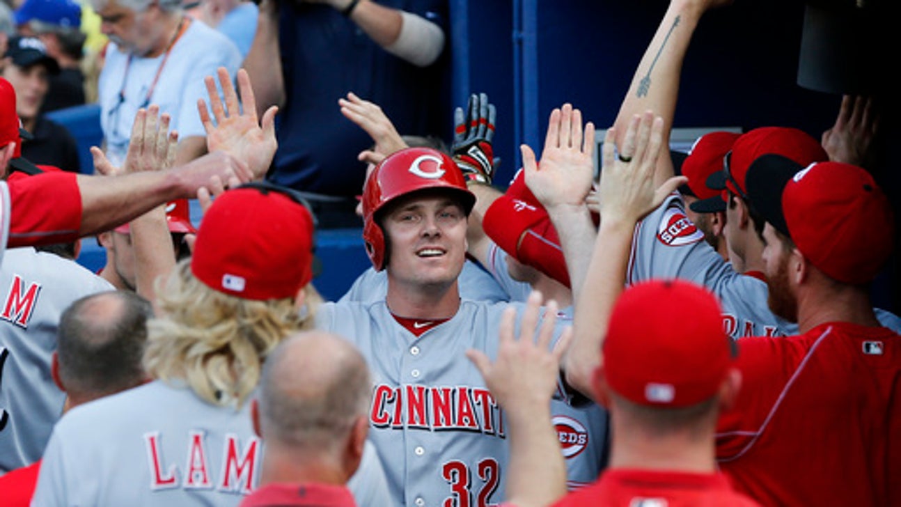 Reds edge Braves 9-8 on Holt's bases-loaded walk in 9th