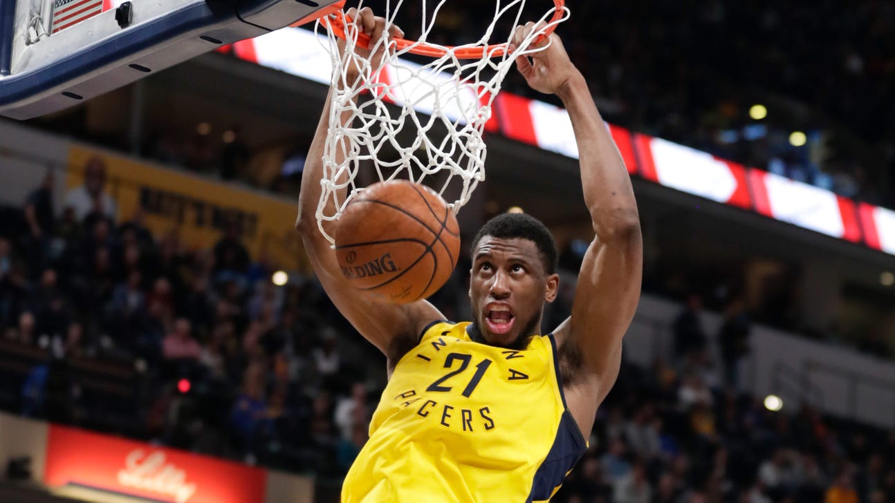 Pacers clinch playoff spot with 113-107 OT win over Heat