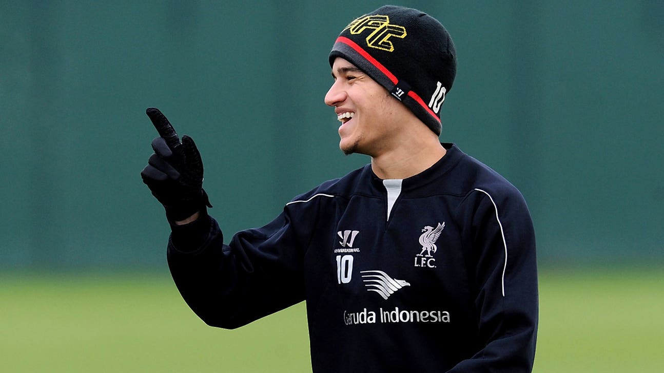 Liverpool's Brazilian midfielder Coutinho signs long-term contract
