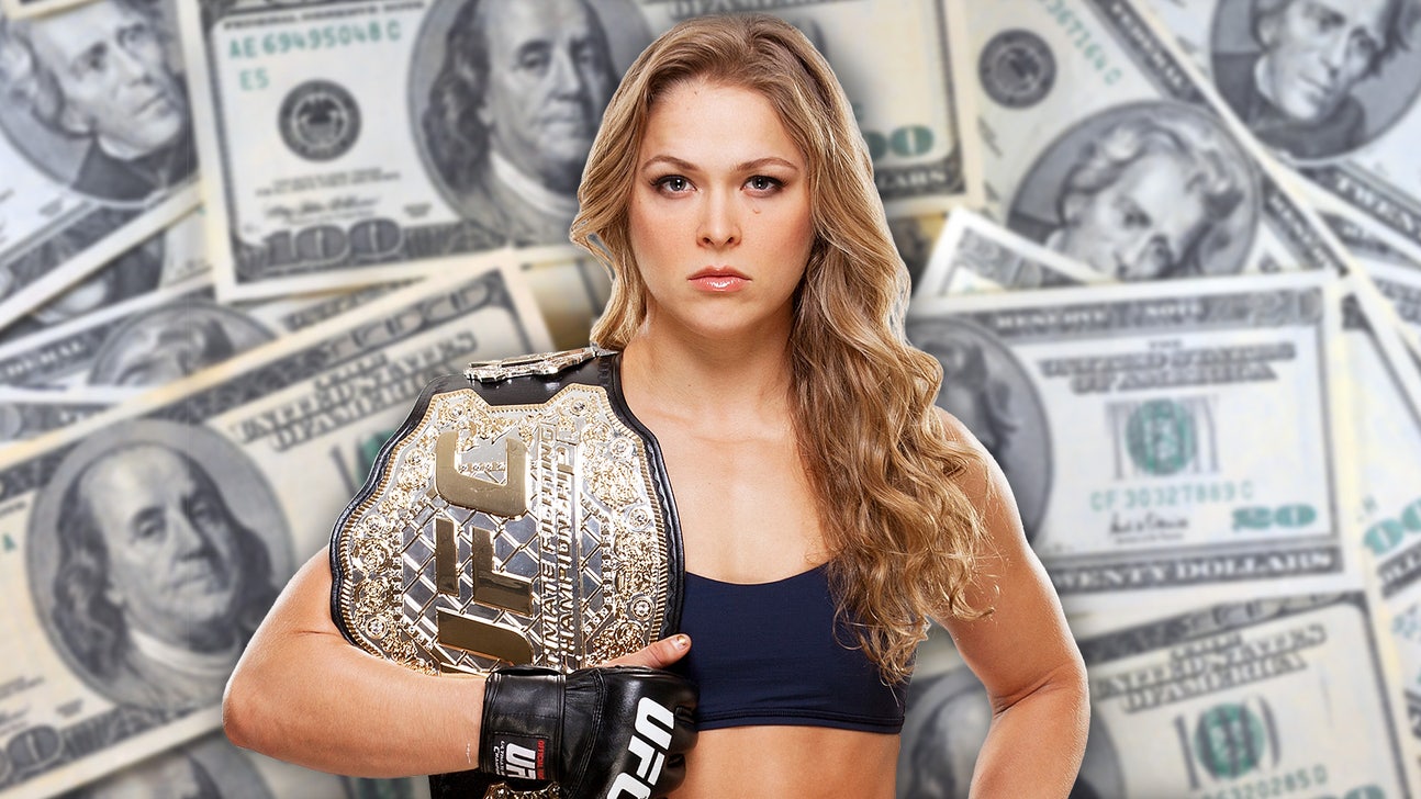 Rousey's corner bets stacks of cash on her