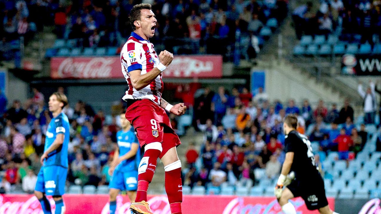 Atletico Madrid squeak out win at Getafe to keep pace in title race