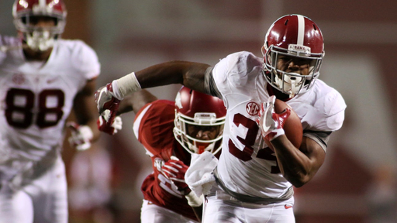 Hurts, Alabama defense, lead way to 49-30 win over Arkansas
