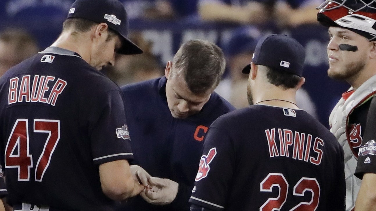Bauer leaves in first inning after blood drips from finger