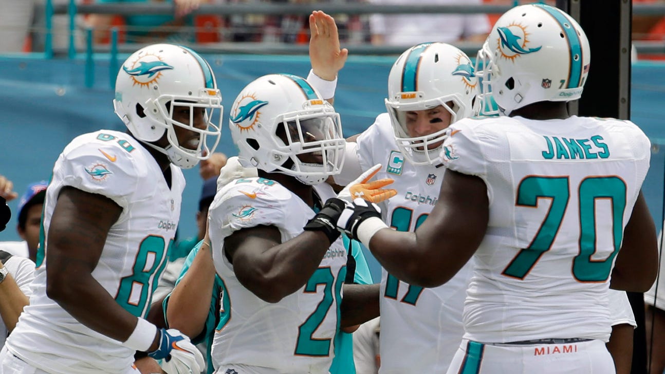 WATCH: Lamar Miller's 85-yard TD caps off Dolphins' record-setting half