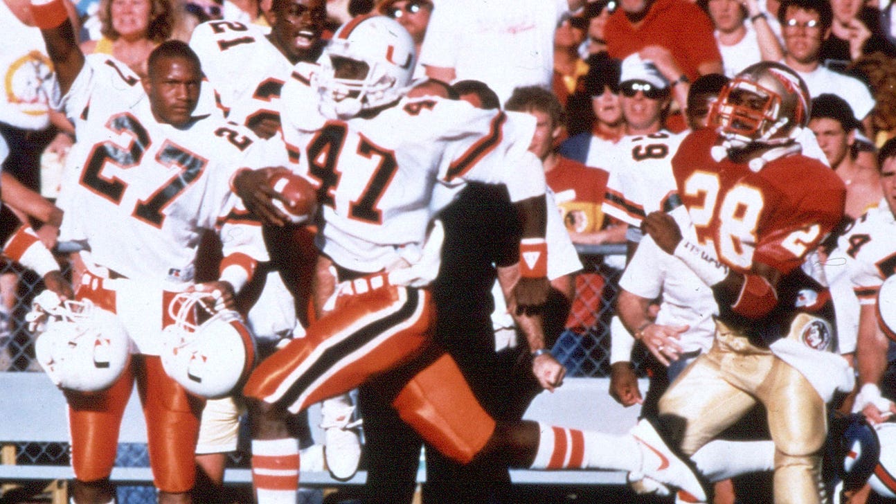 Photo: Former 'U' star Michael Irvin shows his support for Hurricanes