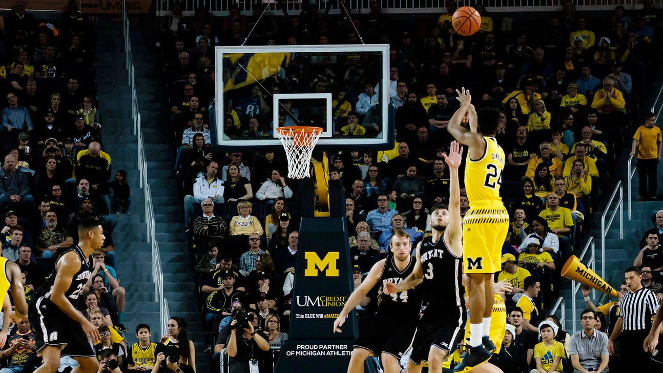 Wolverines hit school-record 17 3-pointers in rout of Bryant