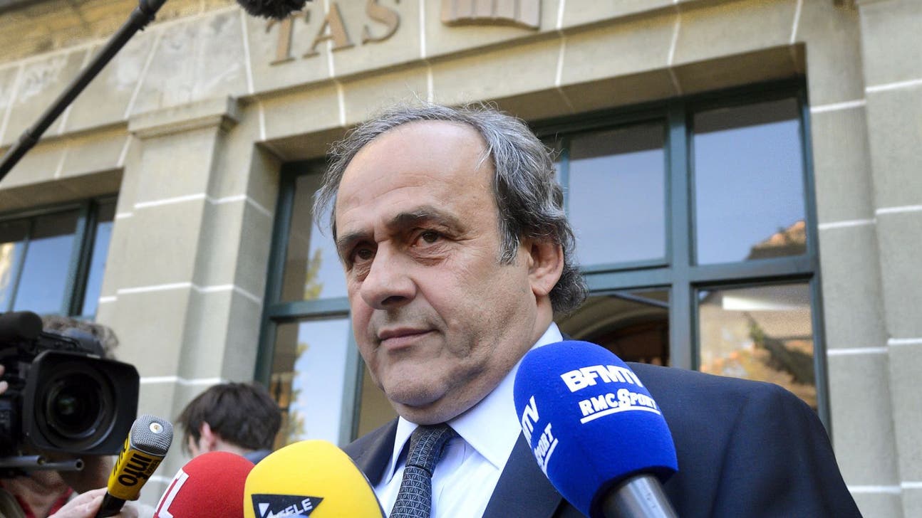 Platini to resign after ban from football reduced from six to four years