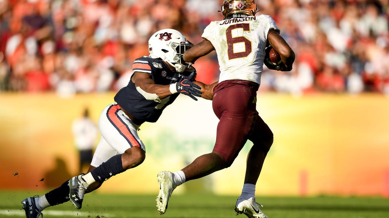 Johnson's record day guides Gophers to 31-24 upset win in Outback Bowl