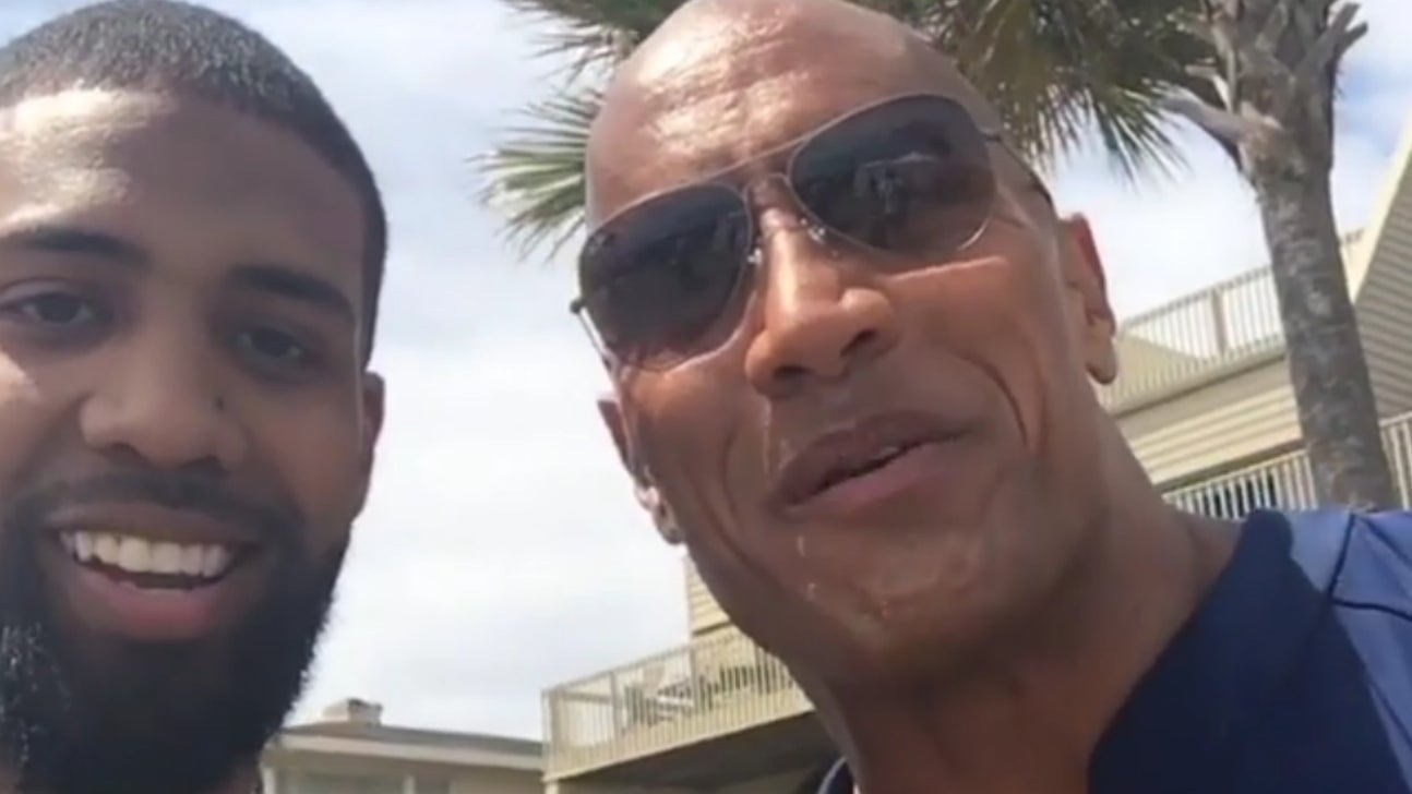 Arian Foster surprises his mom with a special message from The Rock