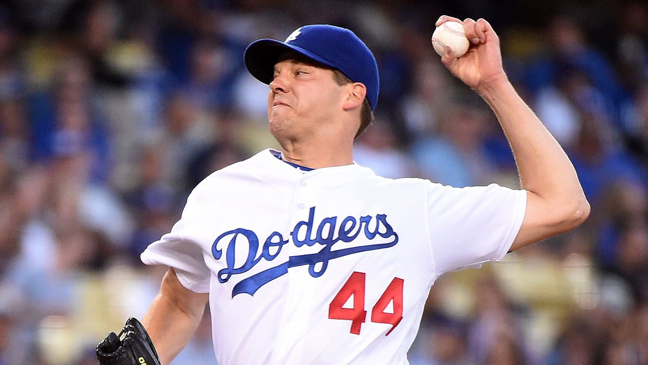 Hill, pitcher Dodgers had to have, earns long-awaited riches with three-year contract