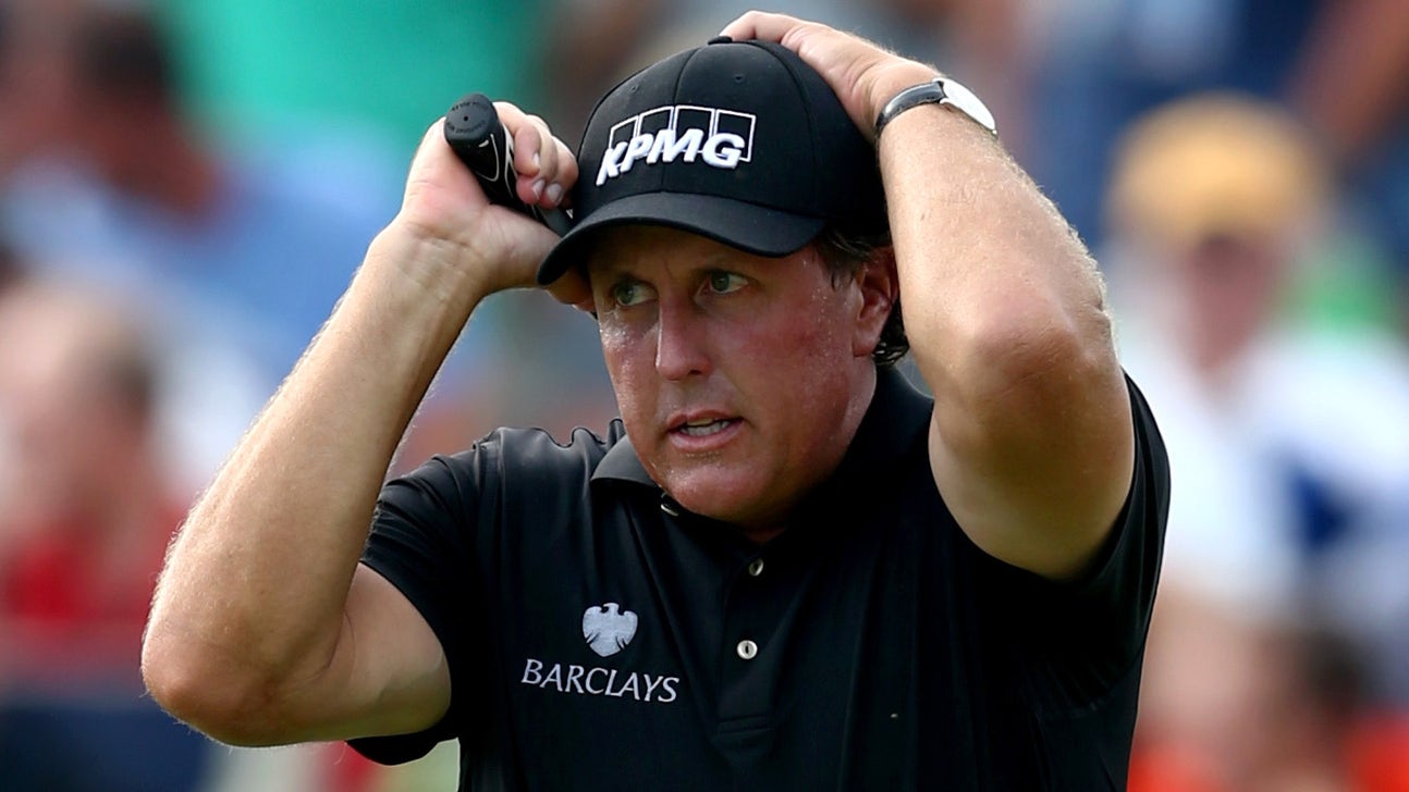 Phil Mickelson hit a tee shot at the PGA Championship into a neighborhood