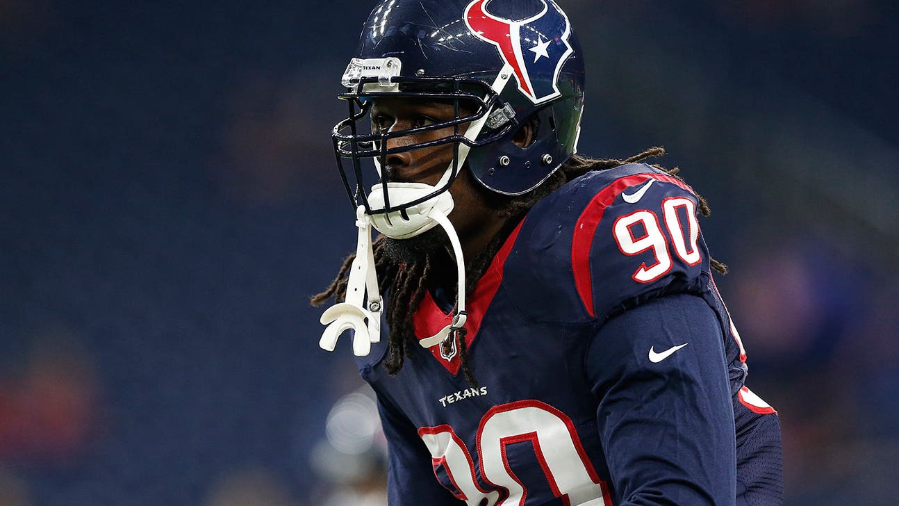 Texans LB Jadeveon Clowney helped off the field with injured back