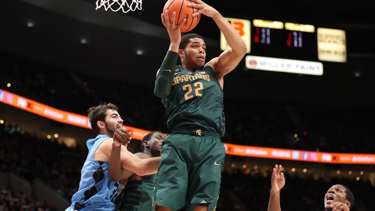 No. 9 Michigan State thumps No. 4 North Carolina 63-45