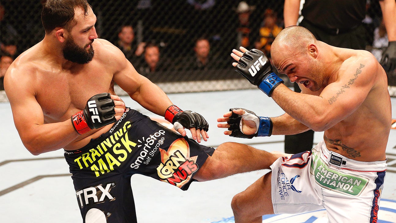 Hendricks wins UFC welterweight title in instant classic over Lawler