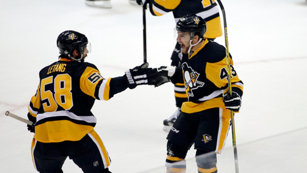 The Latest: Penguins beat Sharks 3-2 in Stanley Cup Game 1