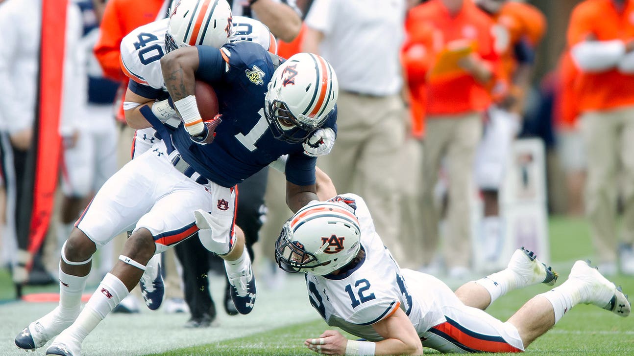 Auburn safety Trey Matthews attempting to fight through injury