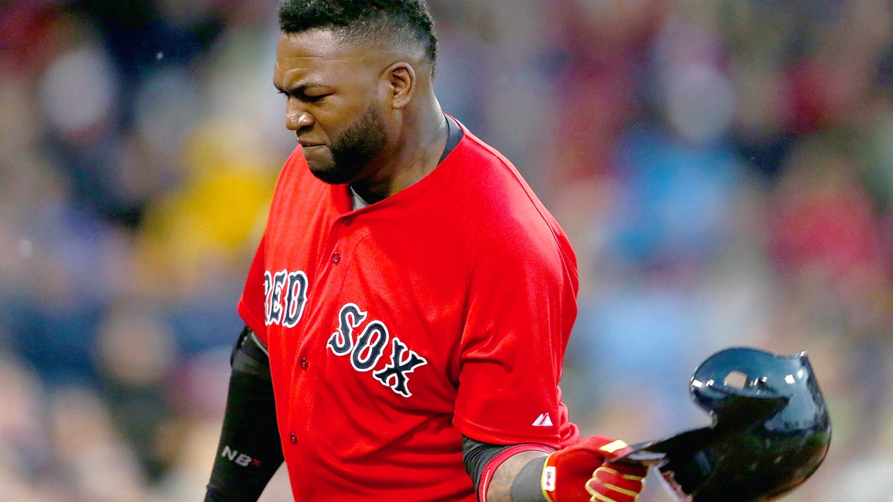 Red Sox fan struggling to put on poncho sums up Boston's season