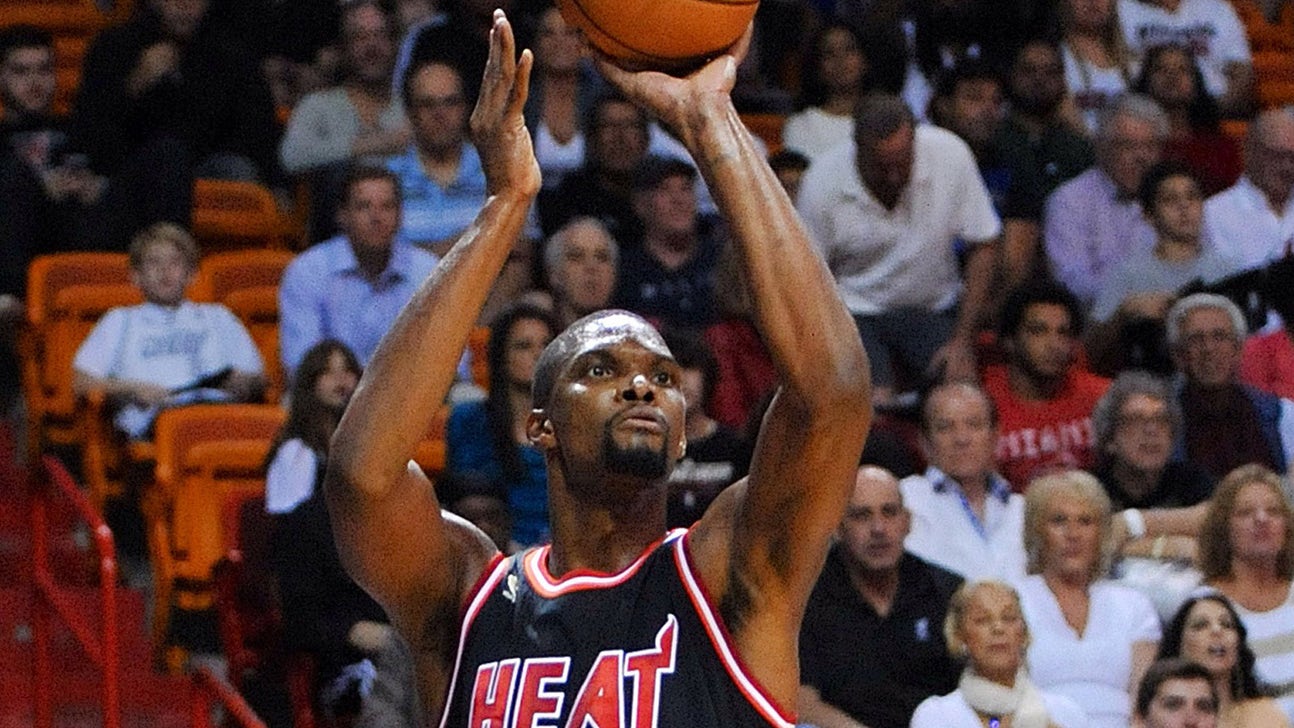Chris Bosh, LeBron James lead Heat past Spurs, 113-101