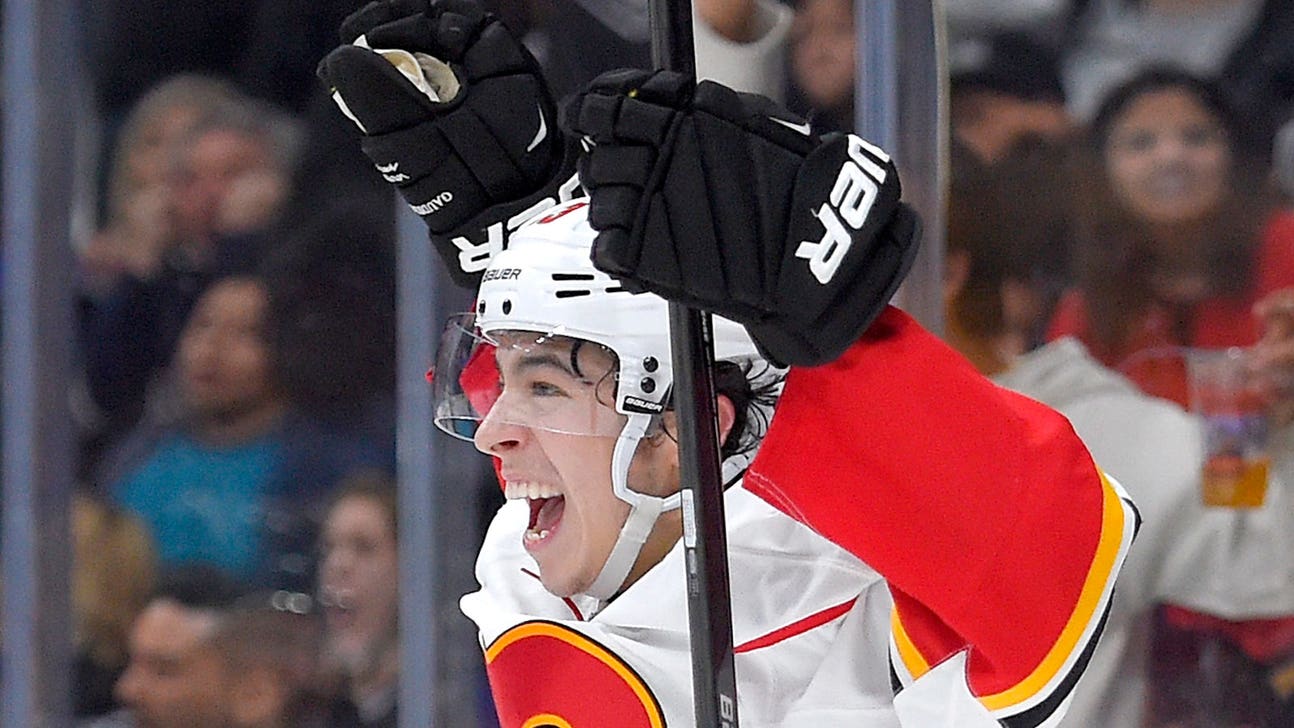 Johnny Gaudreau hat trick helps Flames beat Kings in OT