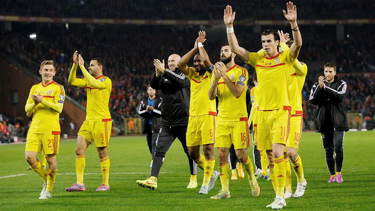 Wales hold Belgium to goalless draw to secure top spot in Group B