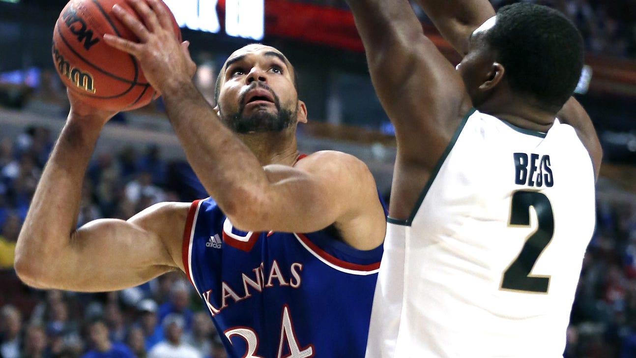 Jayhawks surrender leads, fall to Michigan State 79-73 in Chicago