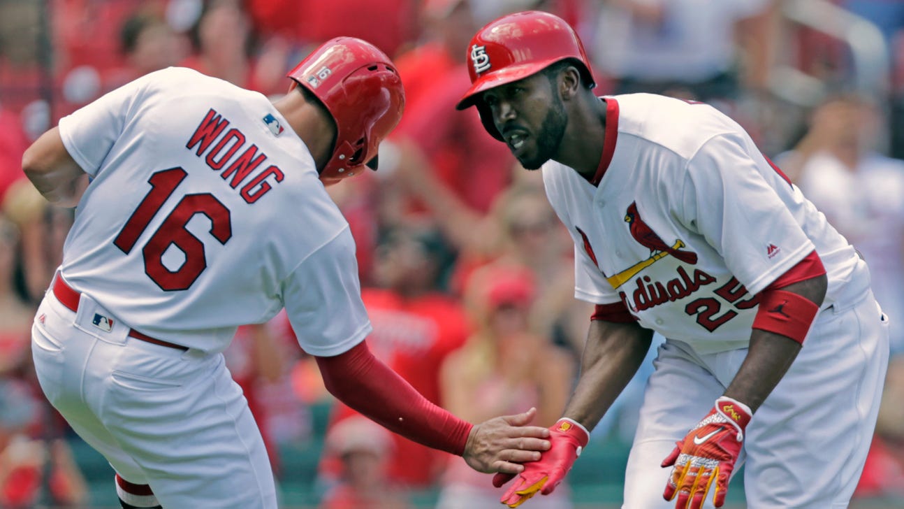 Cardinals place Fowler on DL with fractured foot, activate Wong