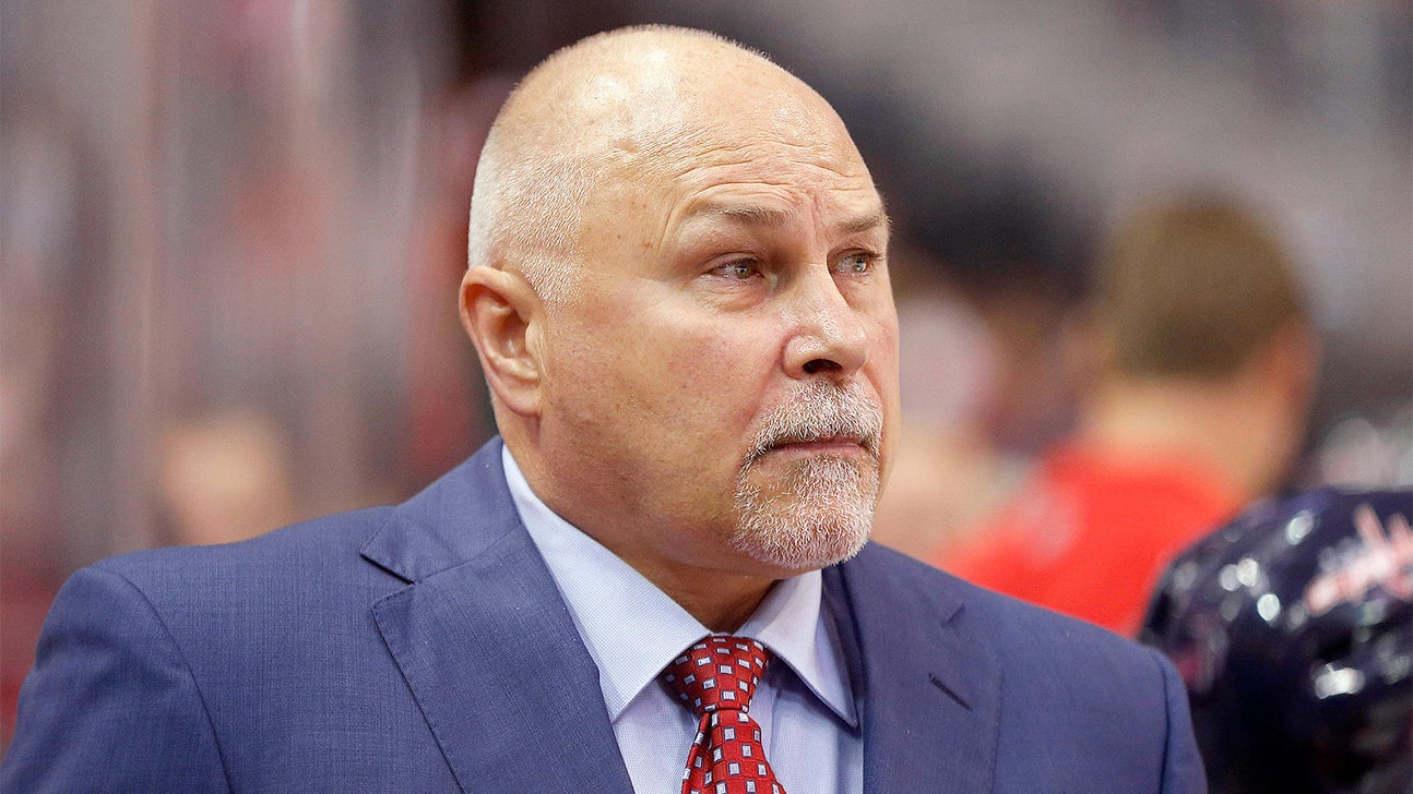 Washington Caps coach Barry Trotz takes puck to the head, soldiers on