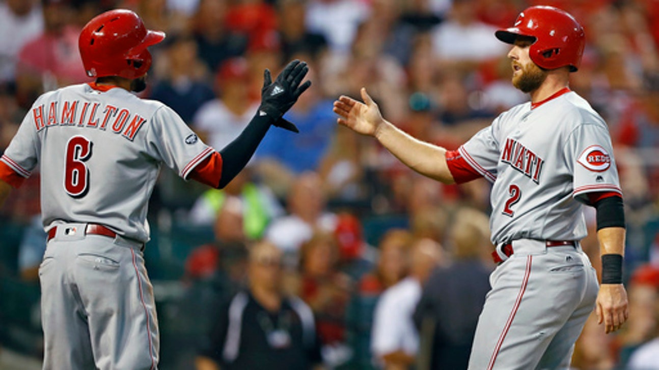Holt sparks 8th inning rally as Reds beat Cardinals